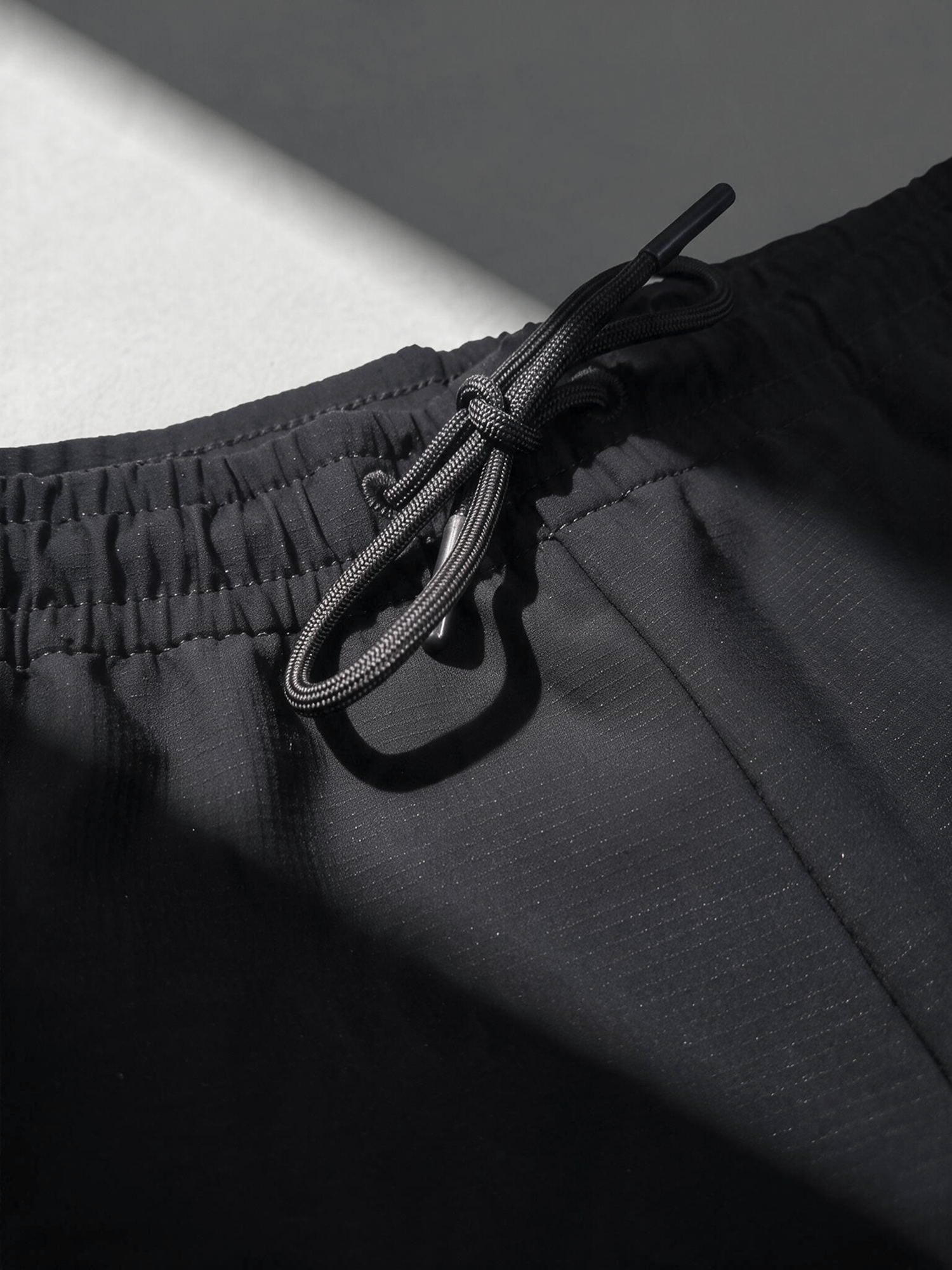 MOVEMENT PANTS Noir gaufré 